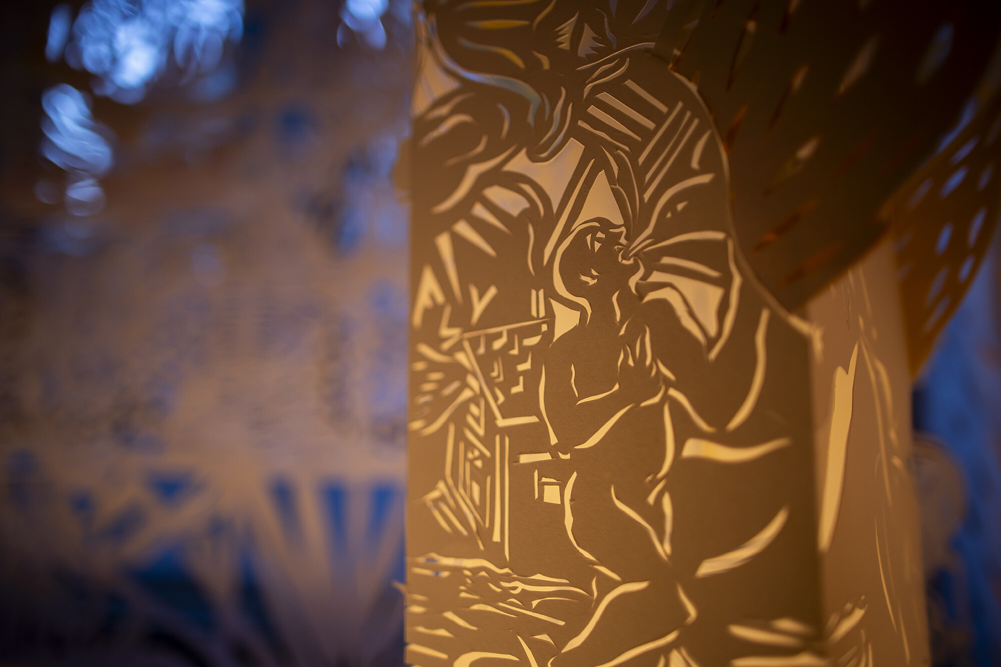 Illuminated Body detail with paper cuts